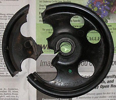 Old pulley cut apart with dremel rotary tool.